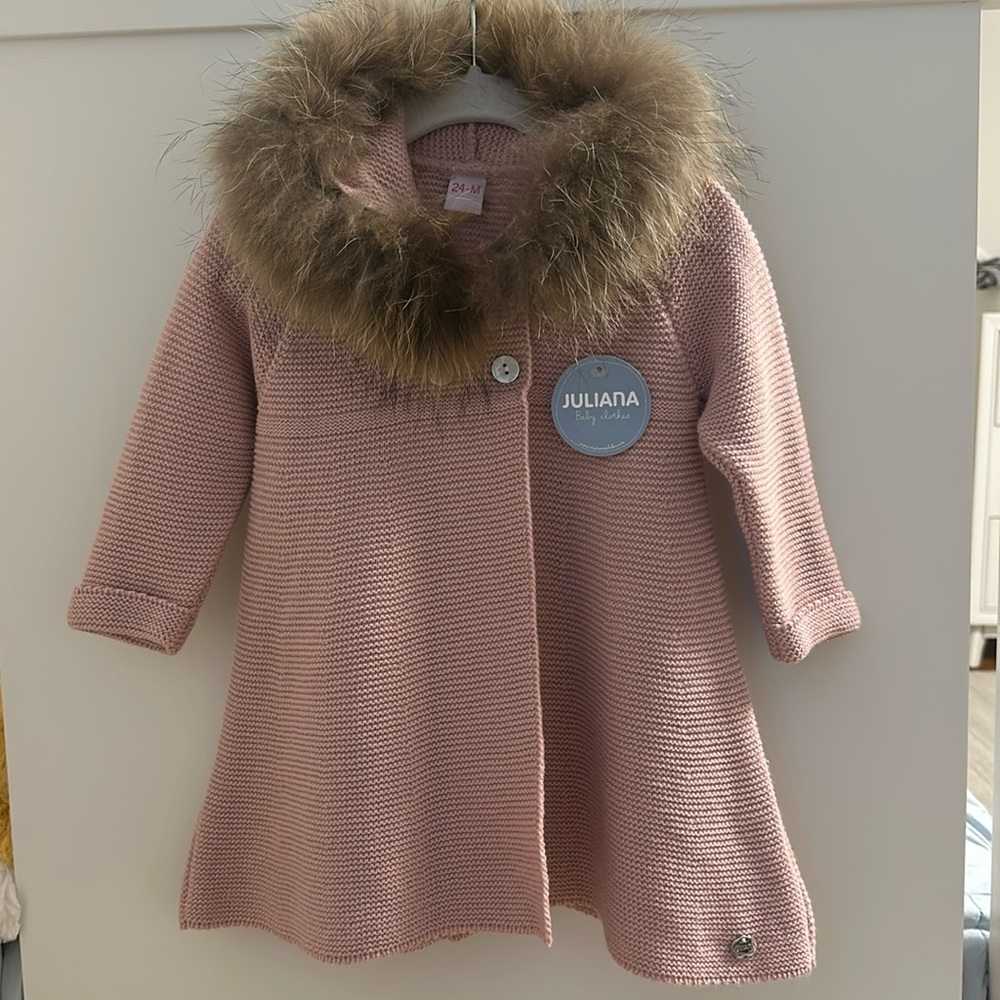 Hooded sweater with real fur trim